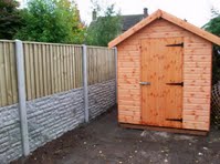 Shed with a timber frame base